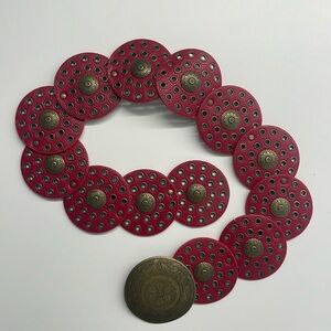 Circle medallion belt in red leather